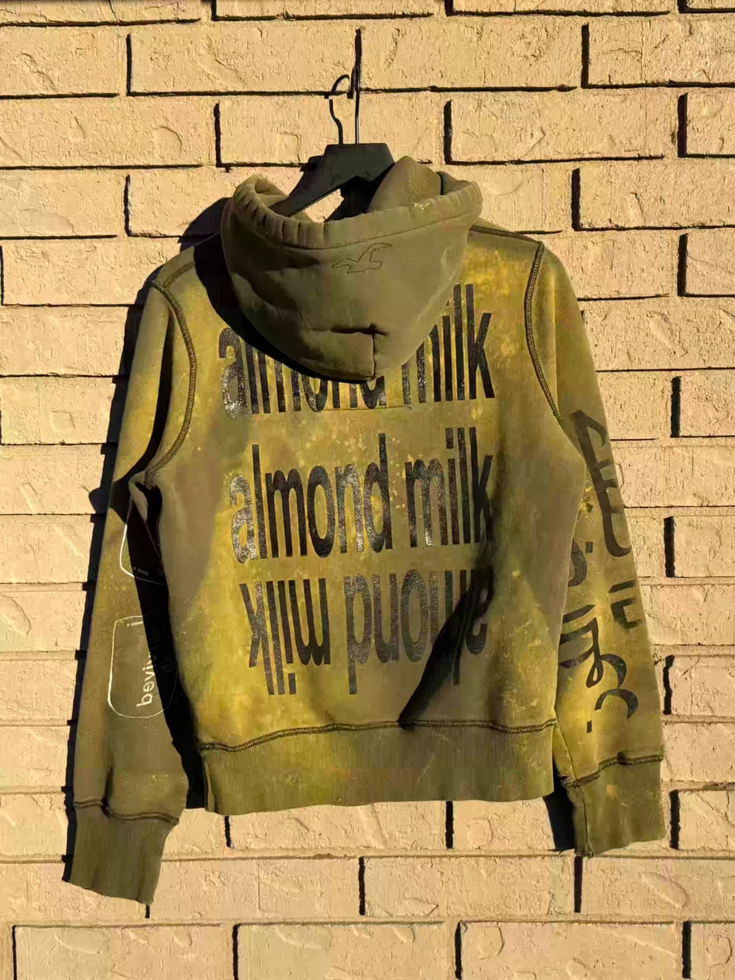 distressed arabic hollister hoodie