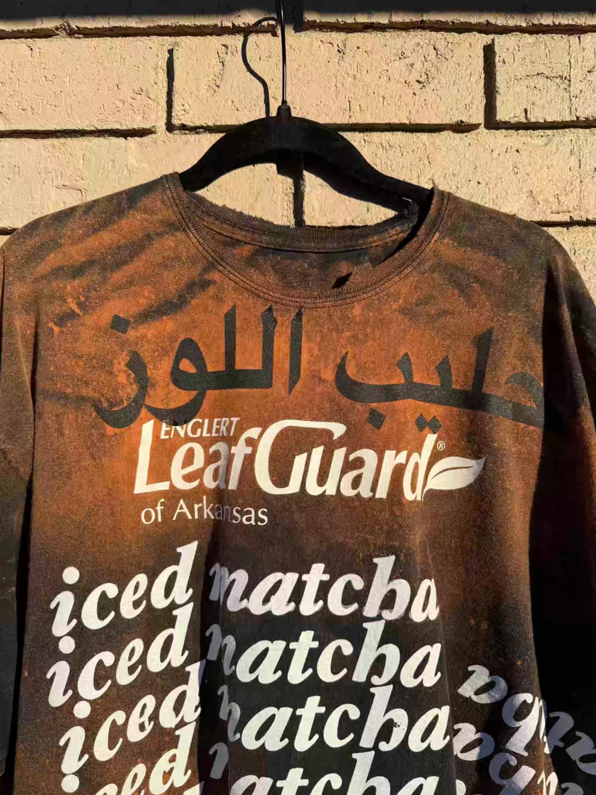 leaf guard arabic tee